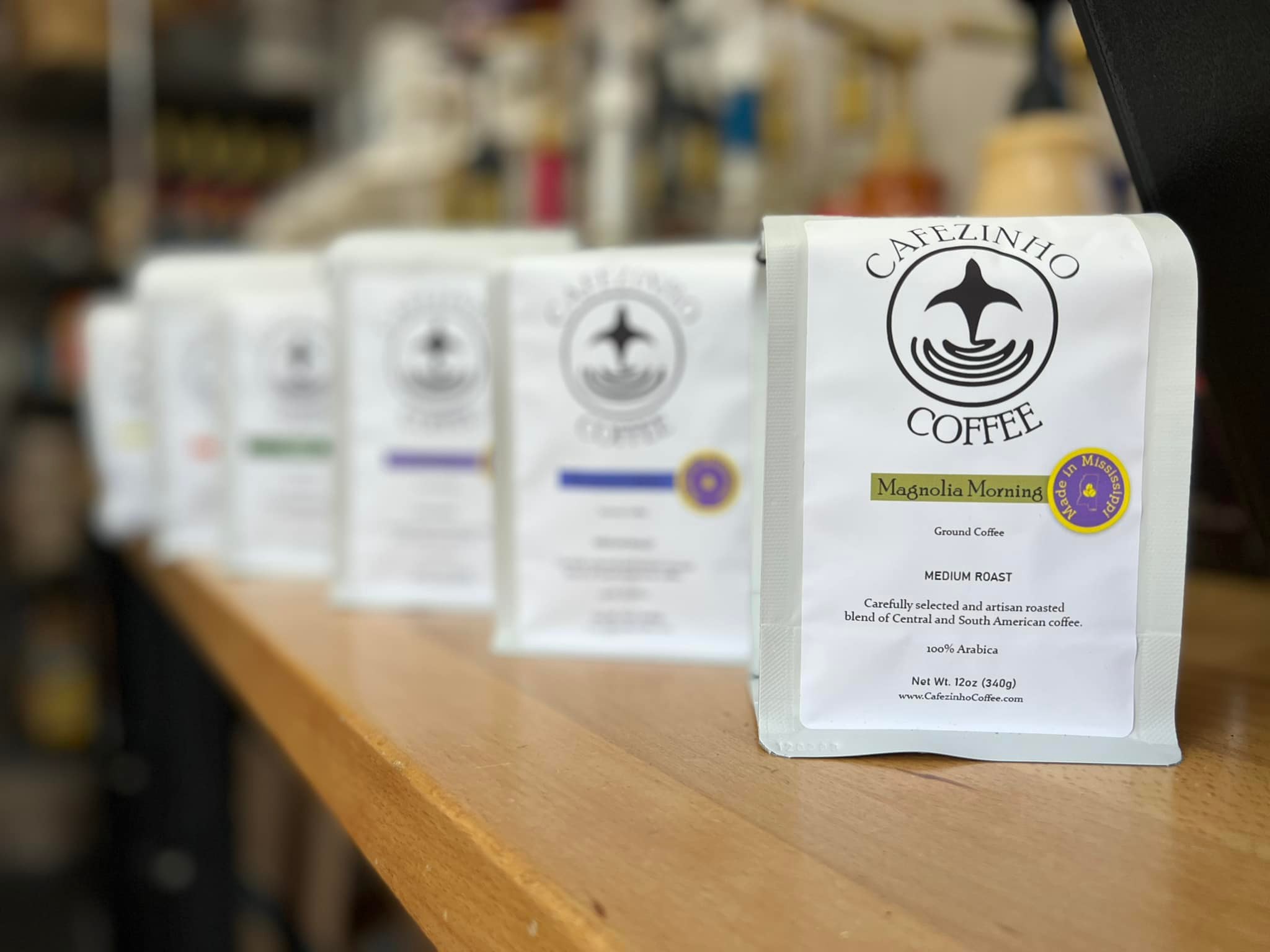 Cafezinho Coffee bags with Magnolia Morning in front
